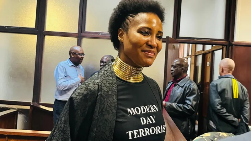 Duduzile Zuma-Sambudla in court wearing a black shirt printed with the words “Modern Day Terrorist.”
