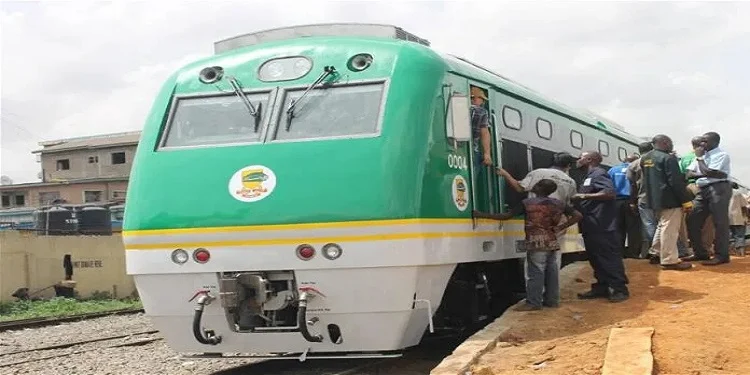 Abuja Kaduna train services resumed March 2026, passenger train on railway track after service restoration