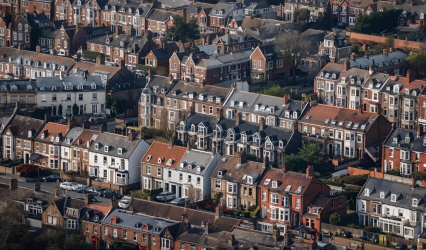 Head Lease Port Harcourt job 2026: financial services executive reviewing leasing strategy and sales reports in office