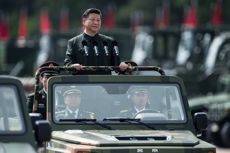 Chinese President Xi Jinping inspecting People’s Liberation Army soldiers AS China hard power strategy
