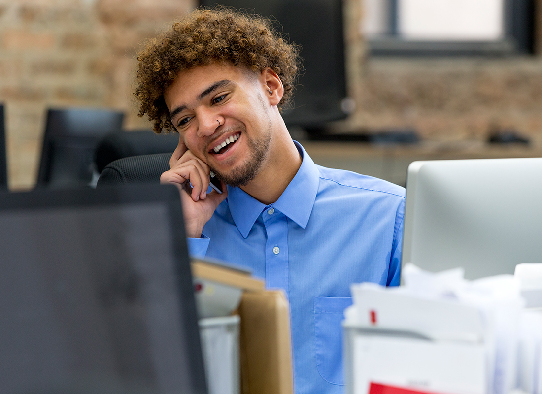 Administrative assistant organizing office documents and scheduling meetings in Lagos office