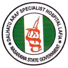 Endoscopy nurse assisting doctors during a medical procedure in a hospital endoscopy unit