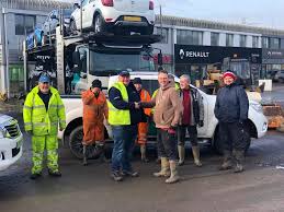 Motorman performing engine maintenance on an offshore vessel