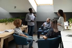 Business Developer Bill Studios Lagos job, Business development professional presenting partnership strategy in a creative studio office