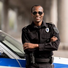 Facility officer coordinating property project activities in a real estate office environment