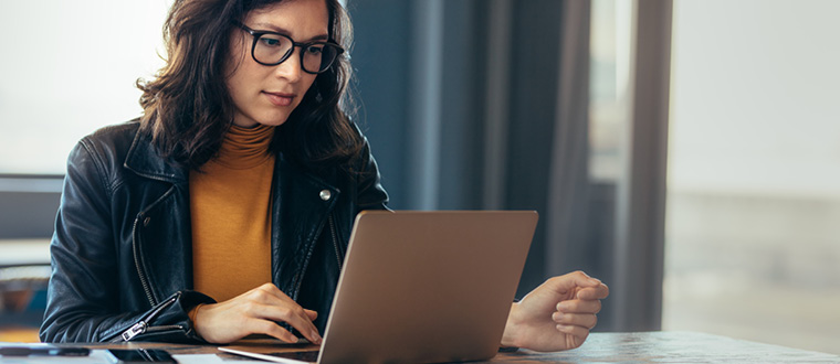 Purchasing Officer Clear Essence Spa Resort Lagos,Purchasing officer reviewing procurement documents and supplier orders in an office