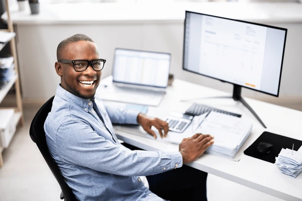 Accountant job Lekki Lagos 2026: Accountant working on financial reports and spreadsheets in Lagos office