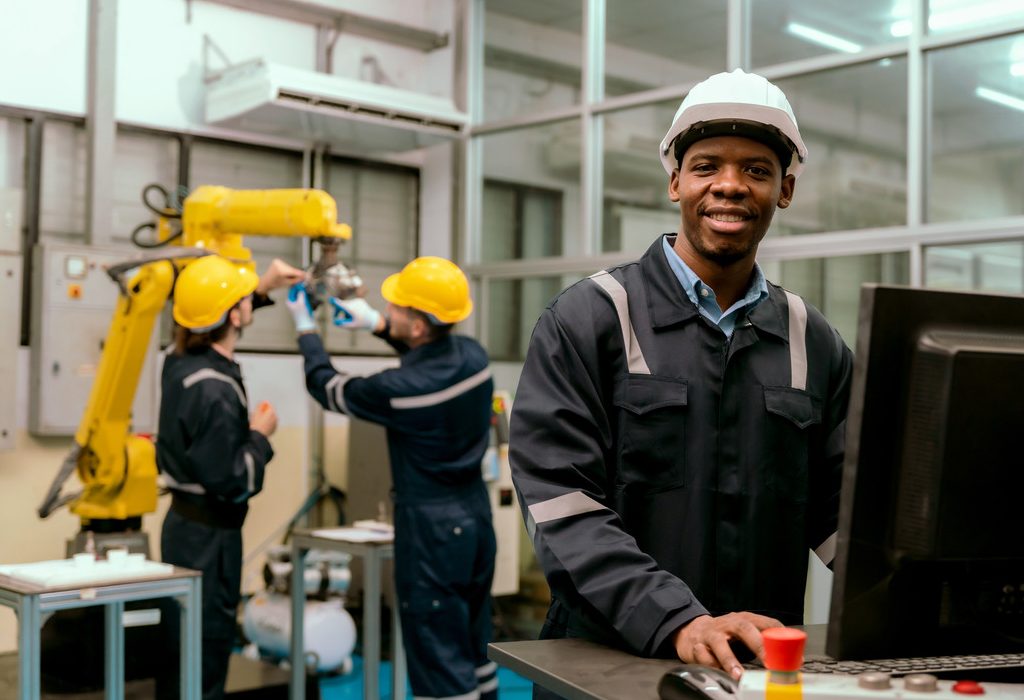 Technotap Nigeria factory worker job Port Harcourt: Factory workers producing paint at Technotap Nigeria facility