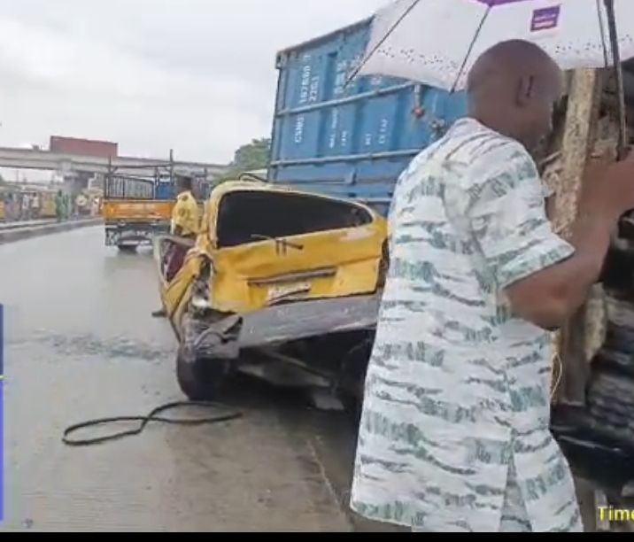 Lagos truck accident Oshodi service lane with emergency responders at the scene”