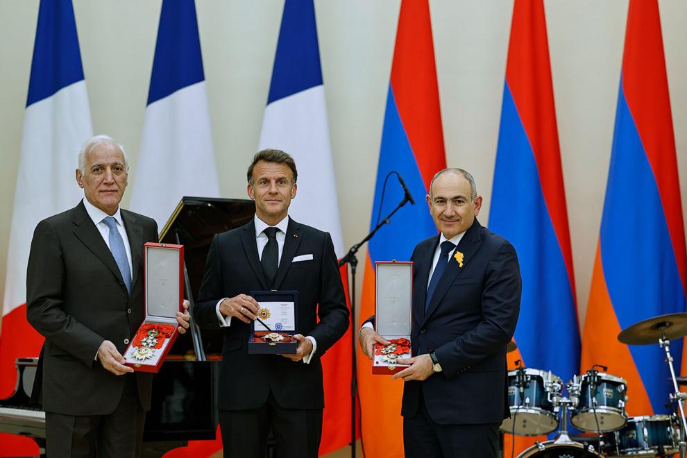 Macron sings for his supper as he croons ballads at state dinner in Armenia