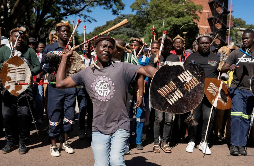 Nigerian repatriation South Africa protests in Pretoria holding placards during anti-immigration rally