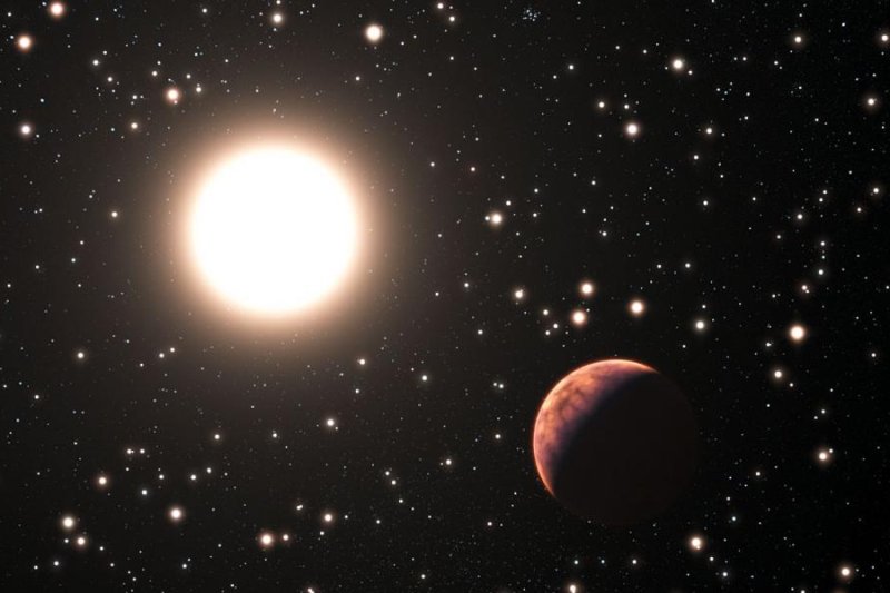 First planet found orbiting a solar twin 