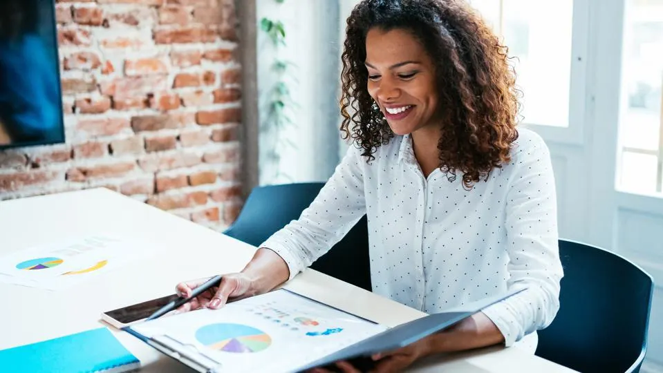 accounting manager job lagos gbagada reviewing financial reports in an office