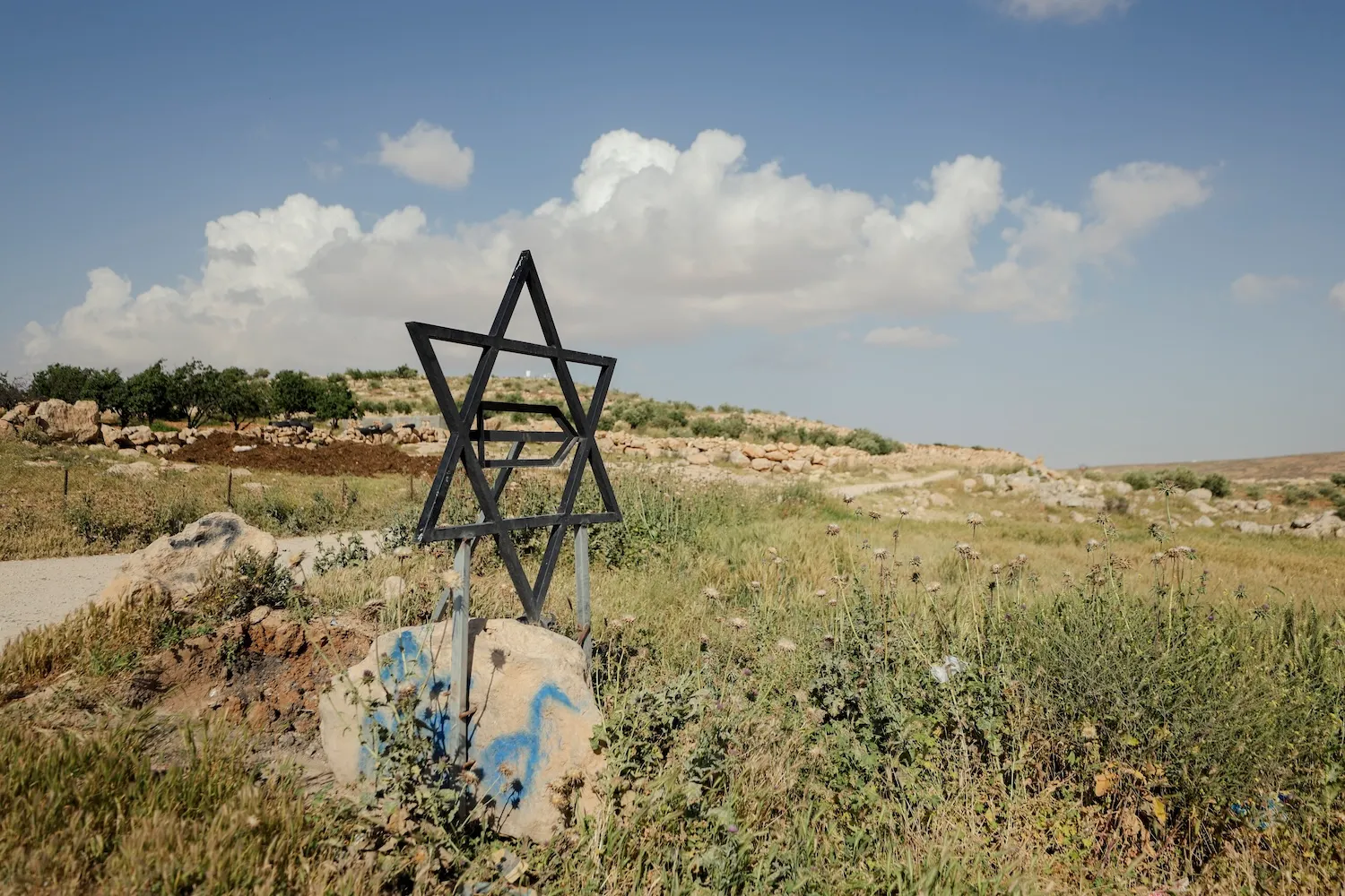 Israel West Bank settlement expansion strategy and symbolic Star of David structure”