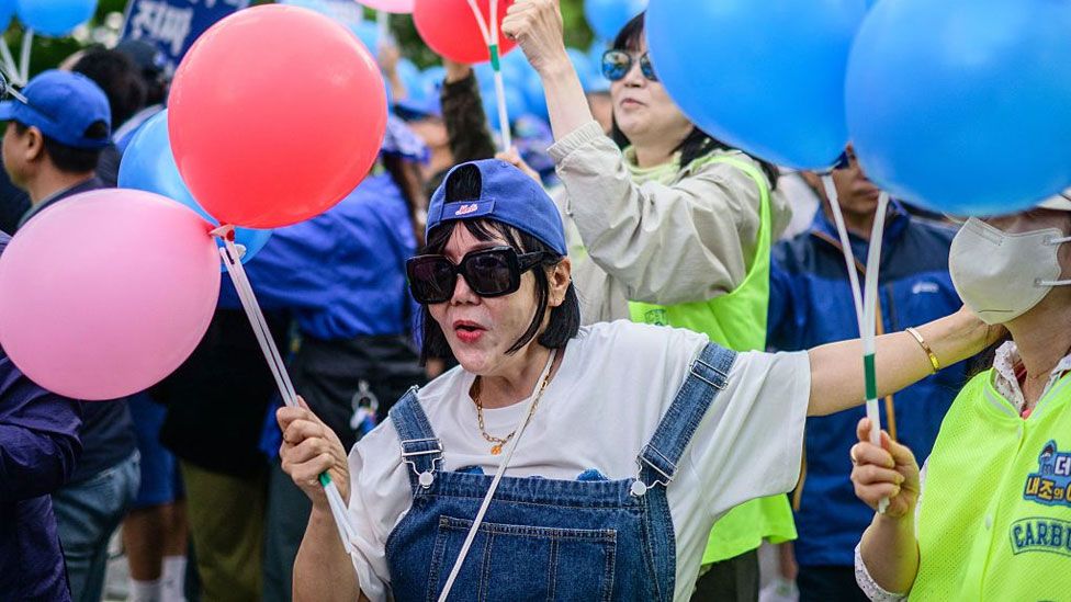 South Korea elections: Exit polls show opposition parties increase majority
