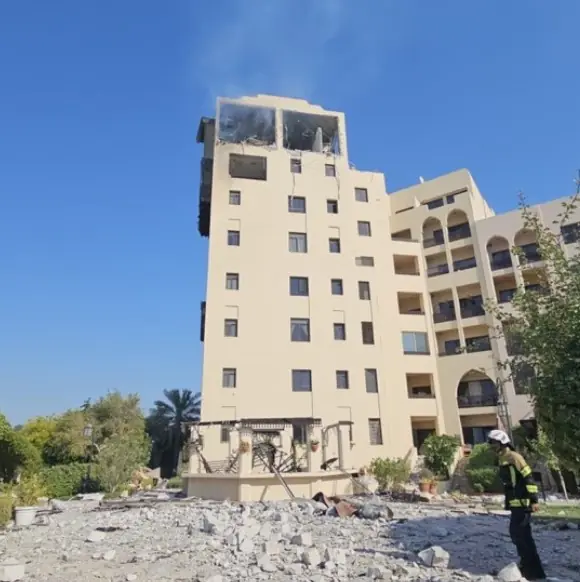 Iranian strike in Bahrain 2026 causing damage to residential building in Muharraq