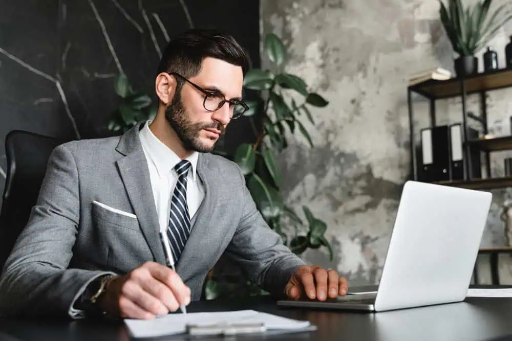 Finance Officer Job in Arepo Ogun reviewing financial reports and accounting records in an office