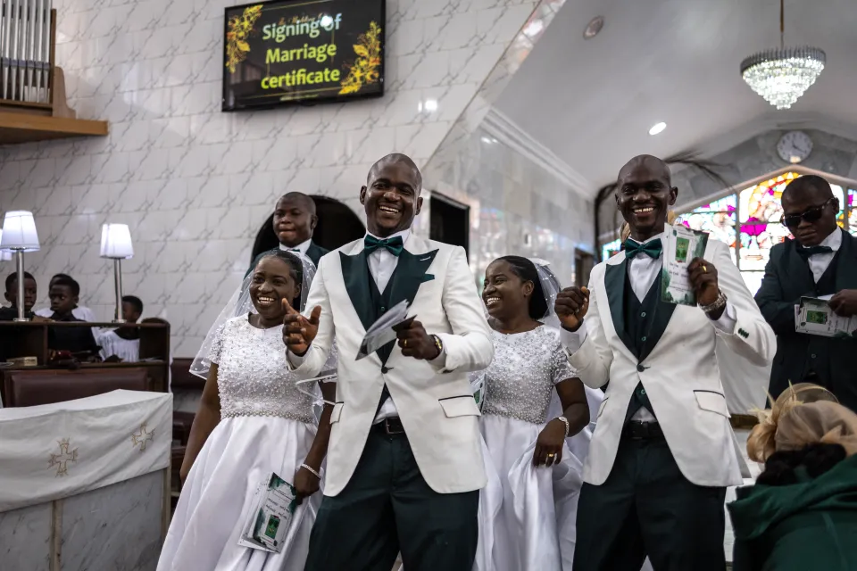 Twin brothers marry twin sisters with EXACTLY the same matching names in rare double wedding