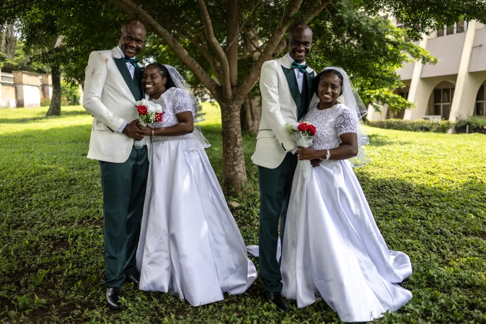 Twin brothers marry twin sisters with EXACTLY the same matching names in rare double wedding
