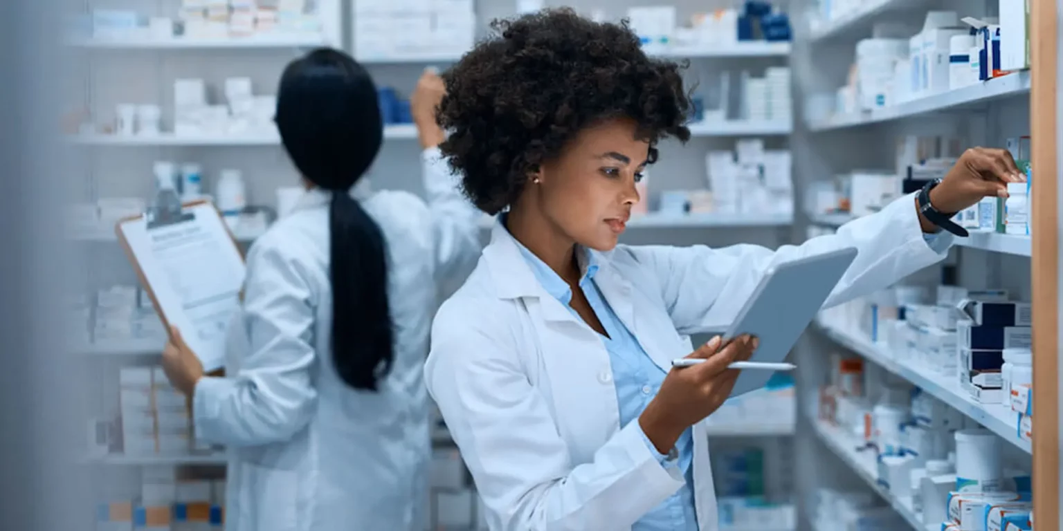 Pharmacist Job in Lagos and Ogun attending to patients in a modern community pharmacy