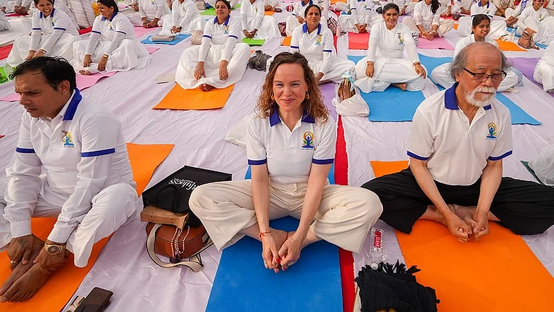 International Yoga Day USA events with participants practicing yoga in community outdoor sessions across Southern US