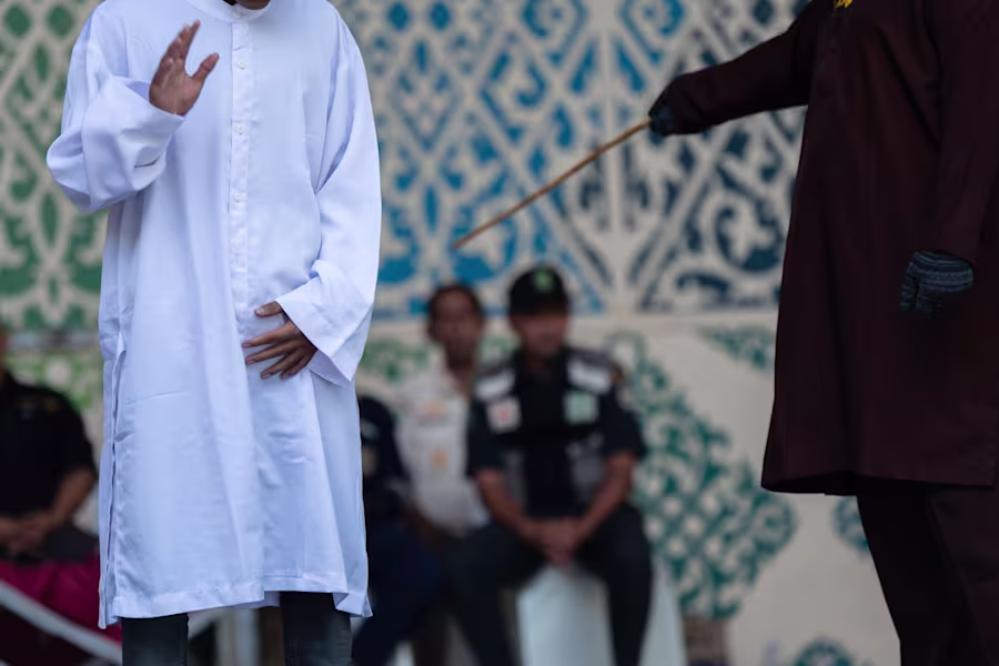 Couple caned for kissing on TikTok in Indonesia's conservative Aceh province