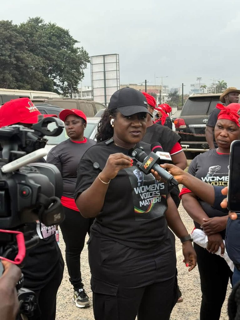 Ghanaian women march in Accra to demand the release of a detained nurse.
