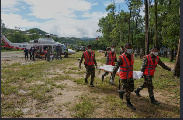 Nepal floods deaths  rises as families hold funerals