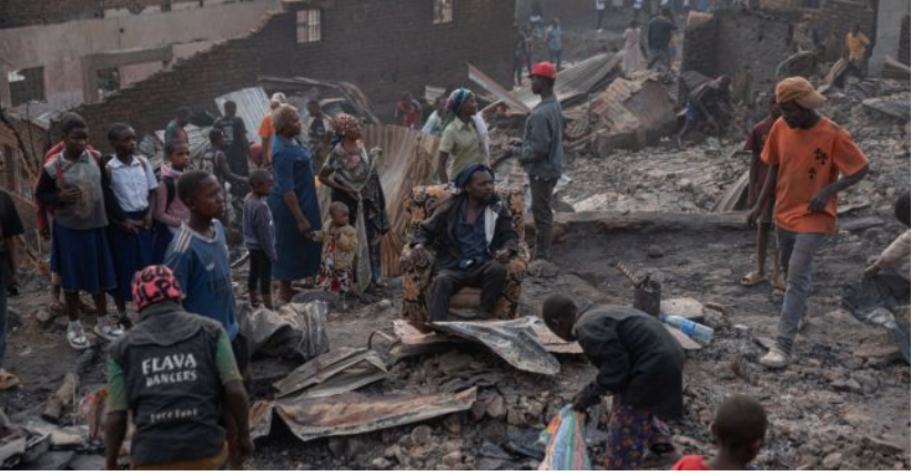 Families and residents return to the area affected by the DR Congo school fire in Bukavu.