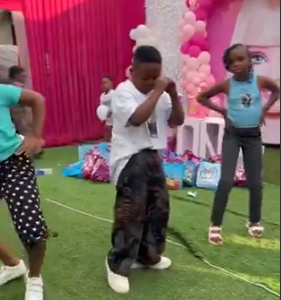Young boy dance moves at children’s party