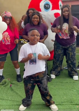 Young boy dance moves steal attention at a children’s party