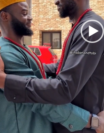 Nigerian men reunion kiss video sparks mixed reactions online.