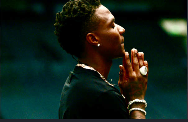Wizkid music plays during the Lagos film screening as fans dance and celebrate.