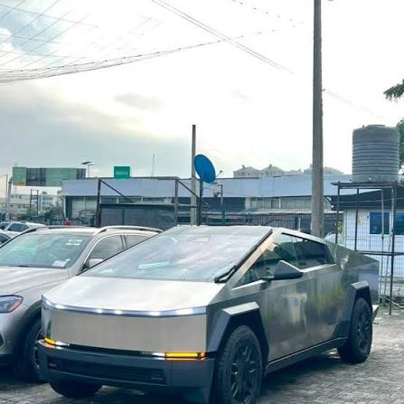 Agberos surrounded a Tesla Cybertruck