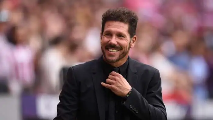 Diego Simeone runs off the pitch after Atlético Madrid defeat Manchester United.