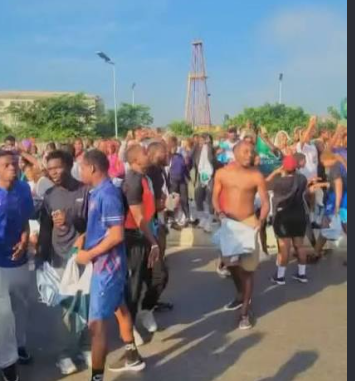 Delta Independence run Tinubu shirts during the reported protest at PTI Junction.