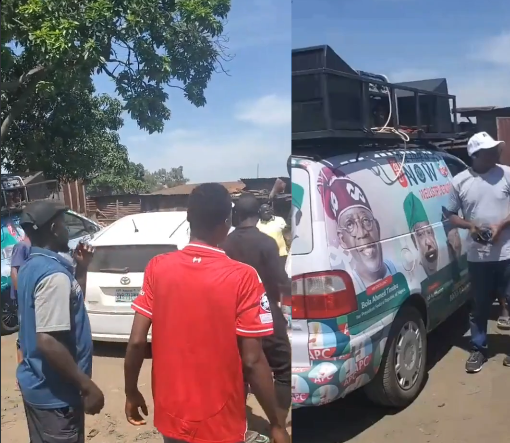 Jos residents chase APC campaign van during a confrontation in Plateau State.