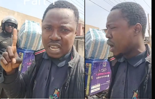  Dispatch rider struggles with an oversized package in Nigeria.