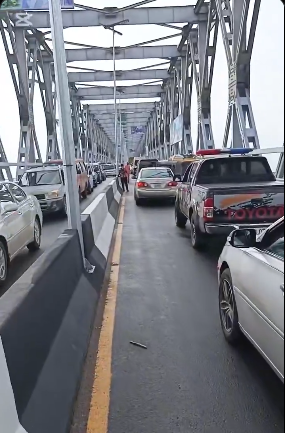 Traffic jam on First Niger Bridge causes delays for motorists after reopening.