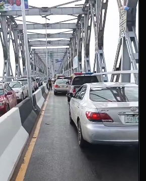 Traffic jam on First Niger Bridge causes delays for motorists after reopening.