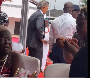 Man Wiping Hand After Palace Handshake